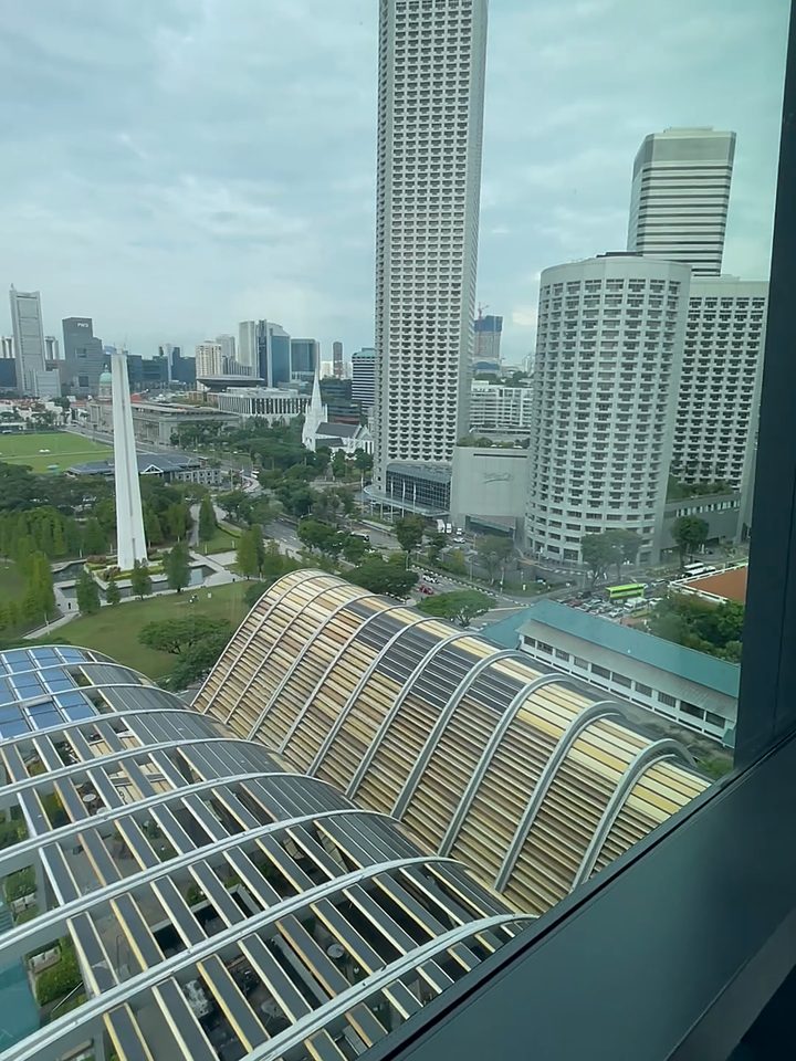 The Padang and the city skyline from the room, from our own footage