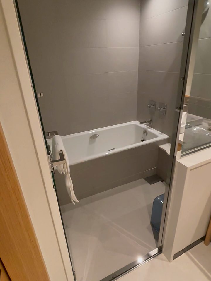 The bathtub and shower, from our own footage
